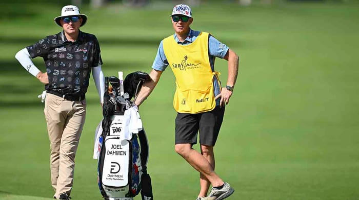 Joel Dahmen with his caddie Geno Bonnalie are pictured at the 2024 Sony Open in Hawaii at Waialae Country Club.